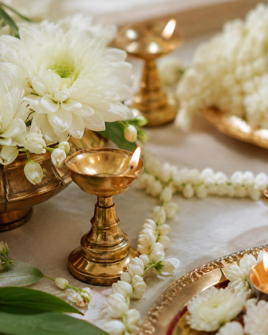 Jasmine garlands and brass diyas